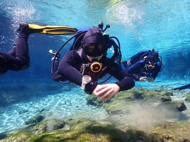 Teen Open Water diver practicing neutral buoyancy. 